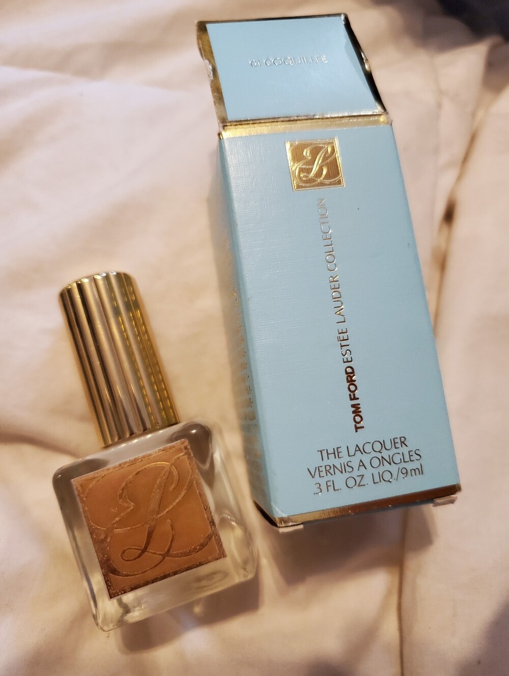 Estee Lauder Nail Lacquer in White with Gold Cap